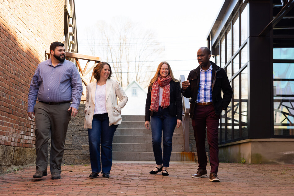Four people walking